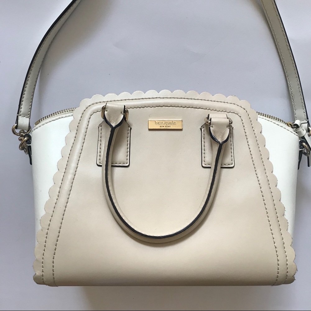 Nude/white Kate Spade scallop bag